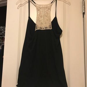 Black camisole with white lace back